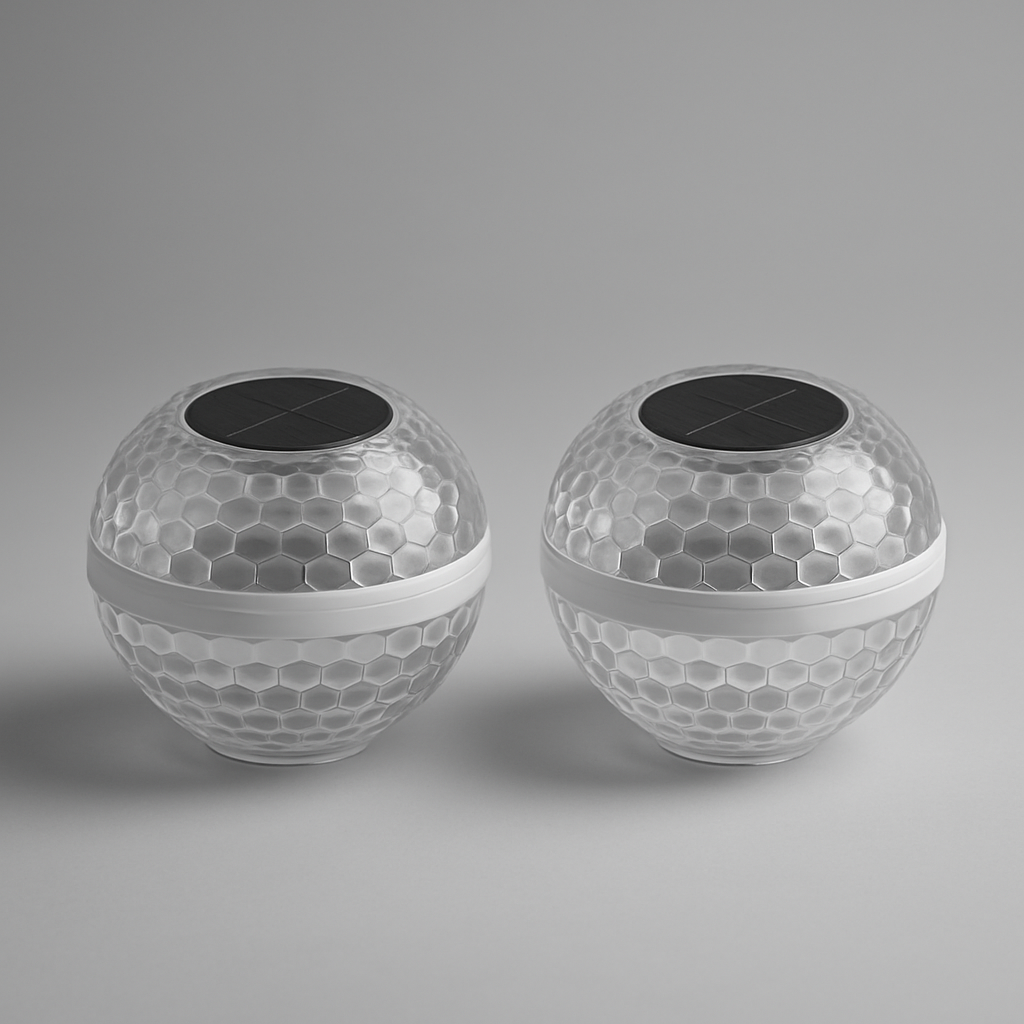 Two solar floating pool light orbs product shot