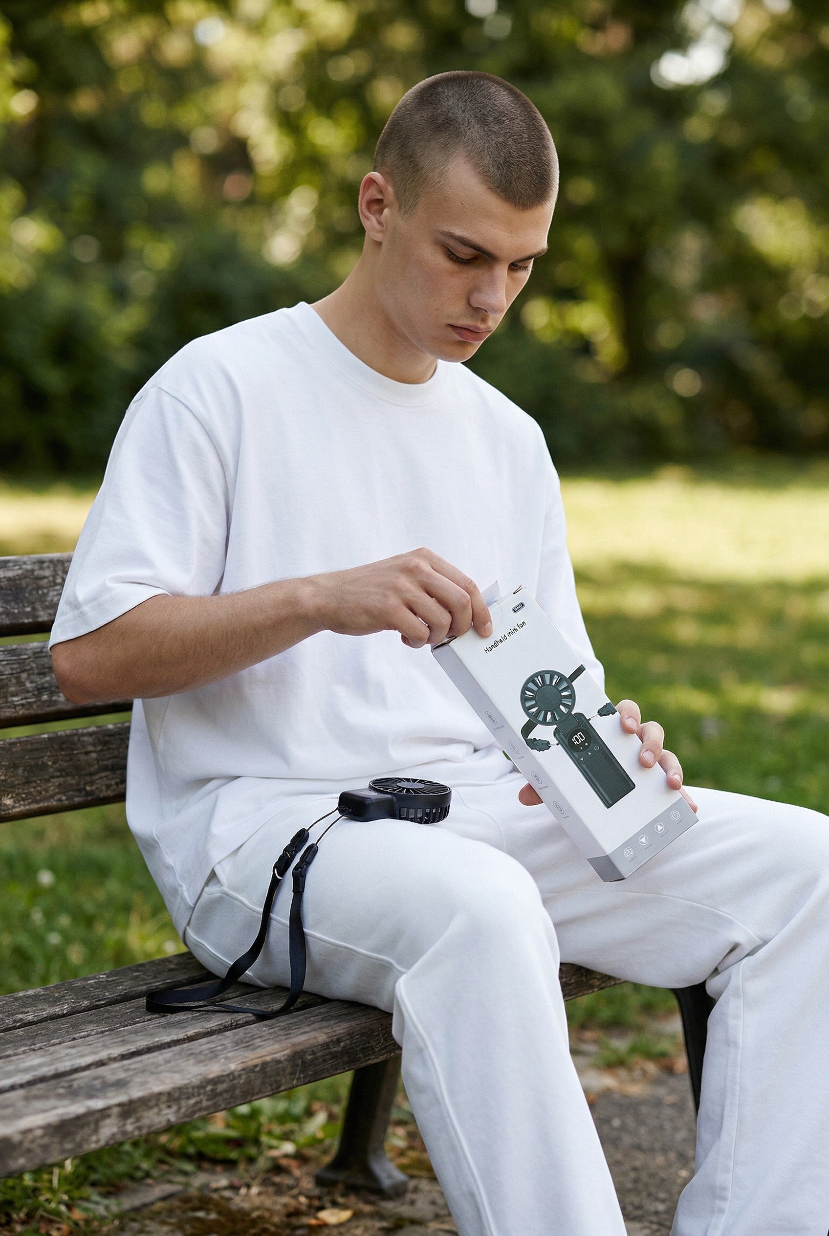 Exquisite Deal Shop black foldable handheld fan with 199 speeds and LED display, 5000mAh battery.