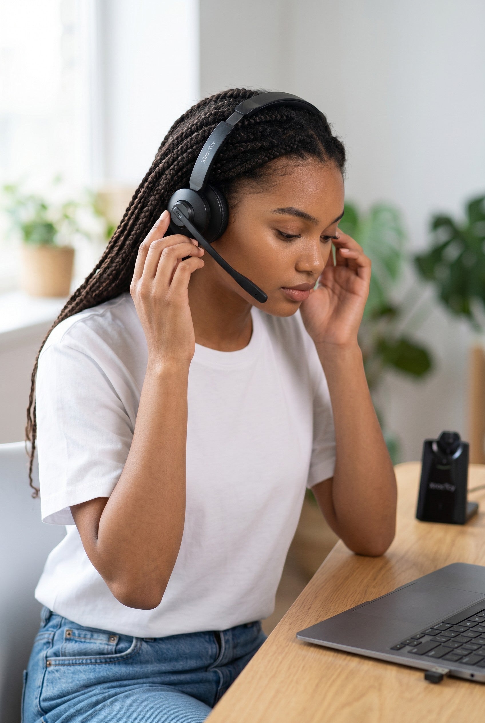 Exquisite Deal Shop XirocTcy XT72-L wireless headset with noise-reducing mic and memory foam ear pads, used by a woman at a desk.