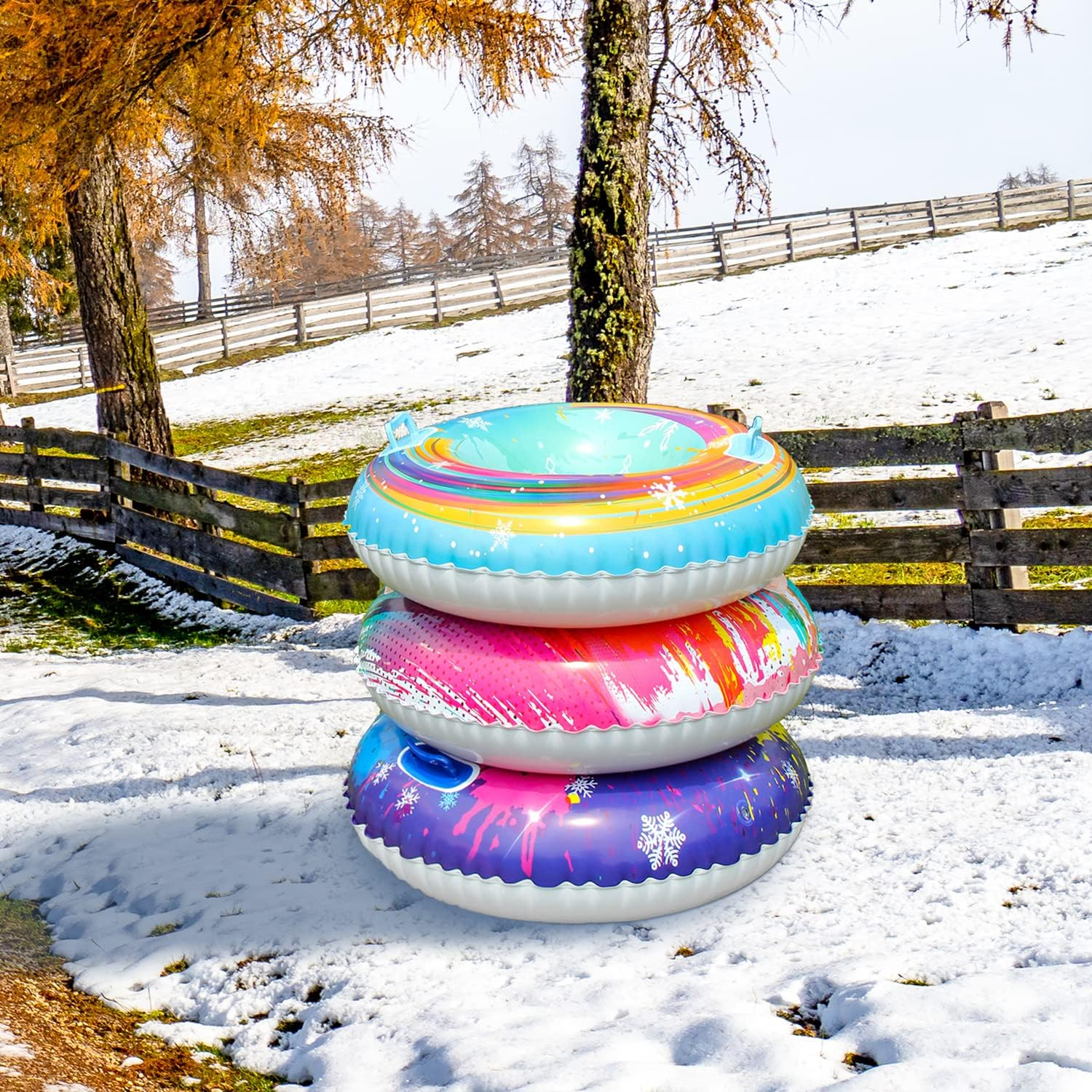 Experience winter fun with the 3 Pack Inflatable Snow Tubes,