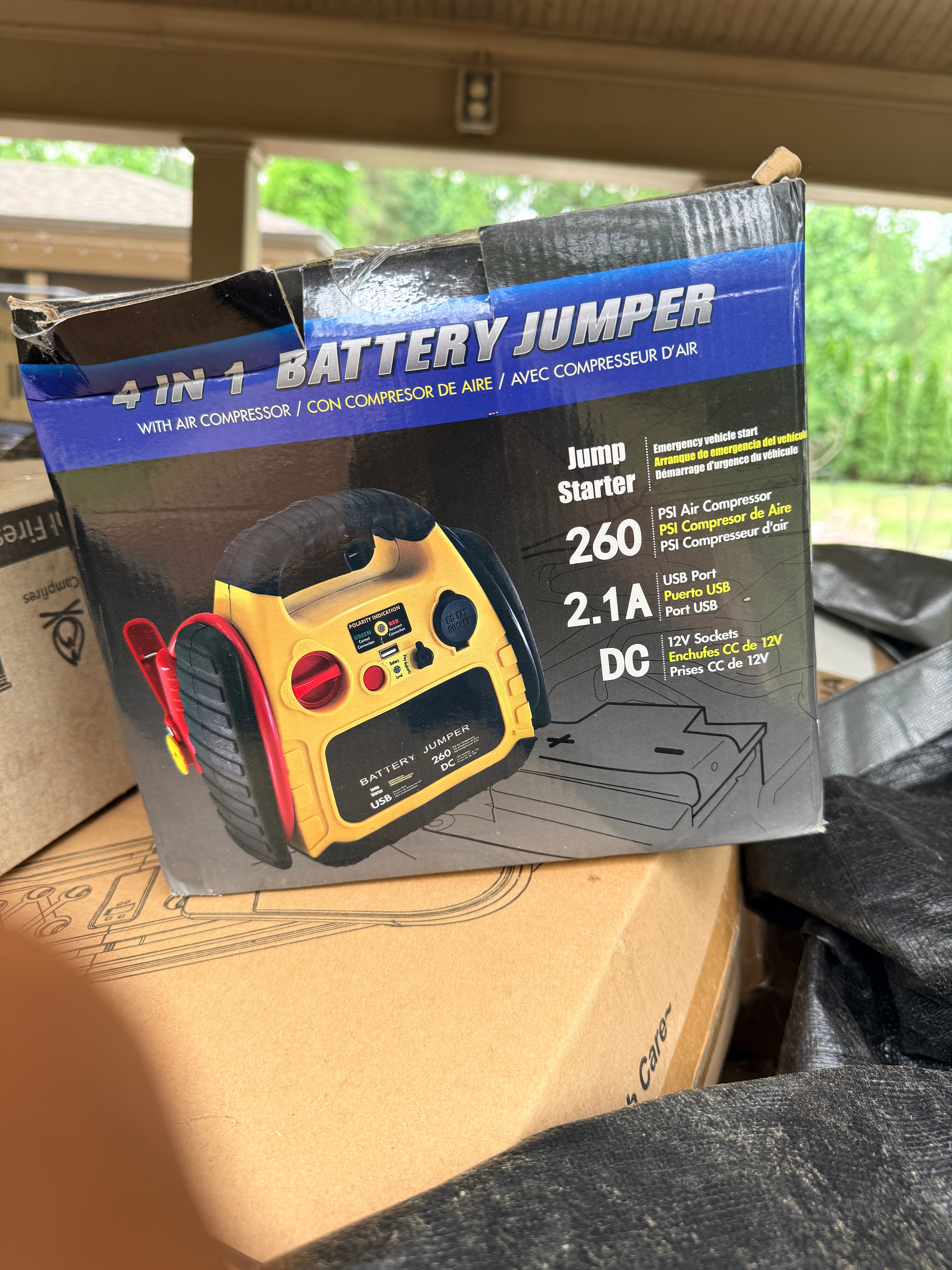 4-in-1 portable jump starter package front
