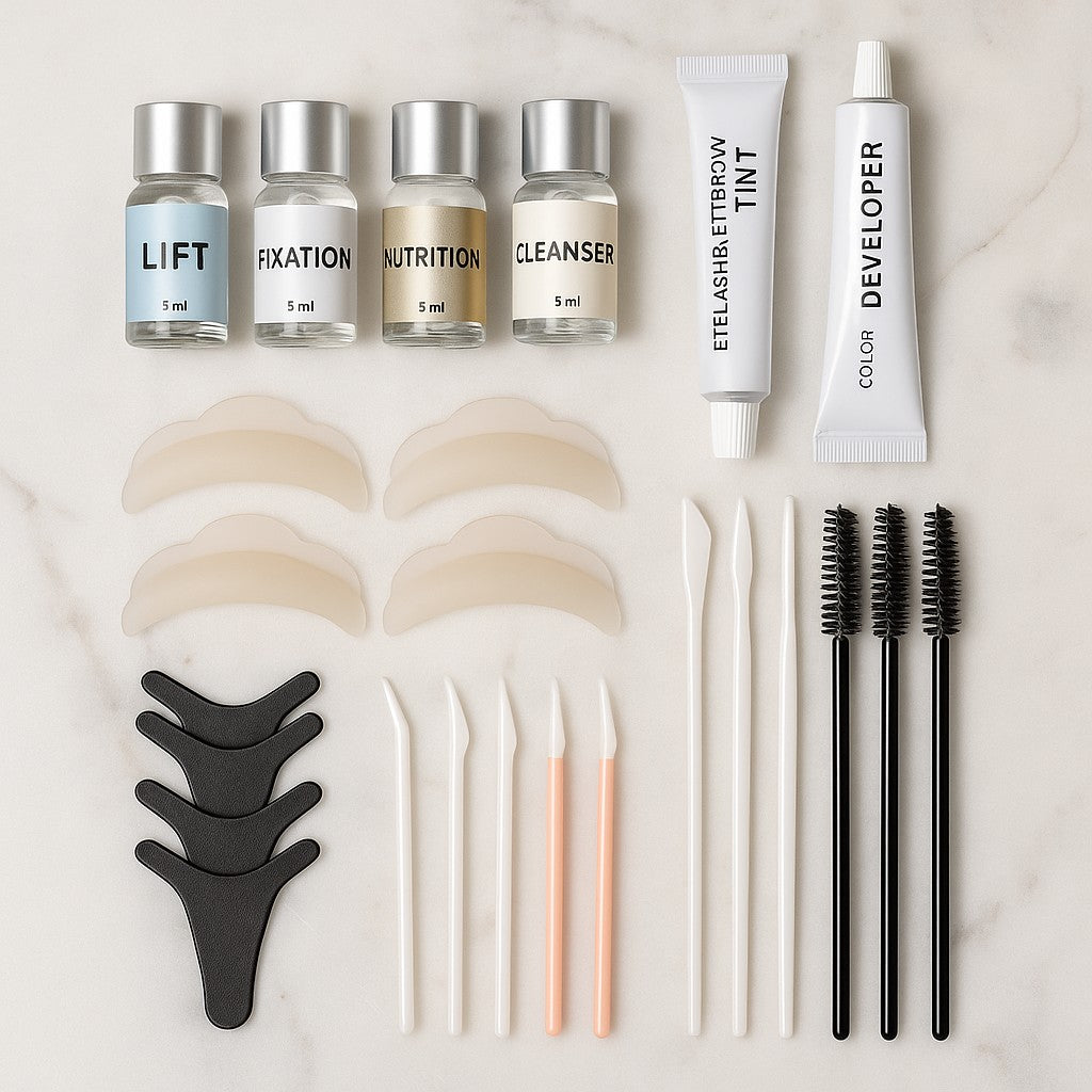 Lash lift brow tint kit flat lay on marble vanity