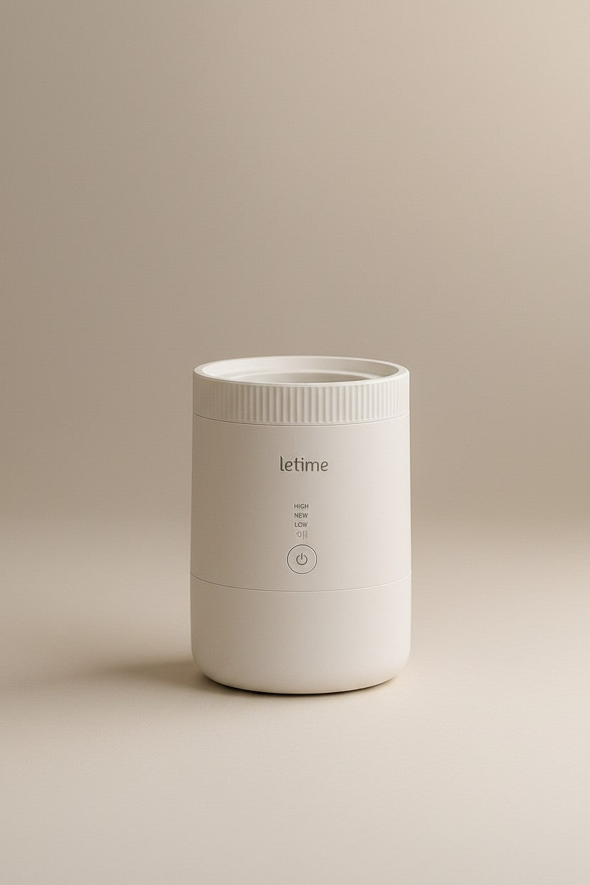 Exquisite Deal Shop Let'me smart tower humidifier being filled with water from a glass pitcher. Features top-fill design and sleek black finish.