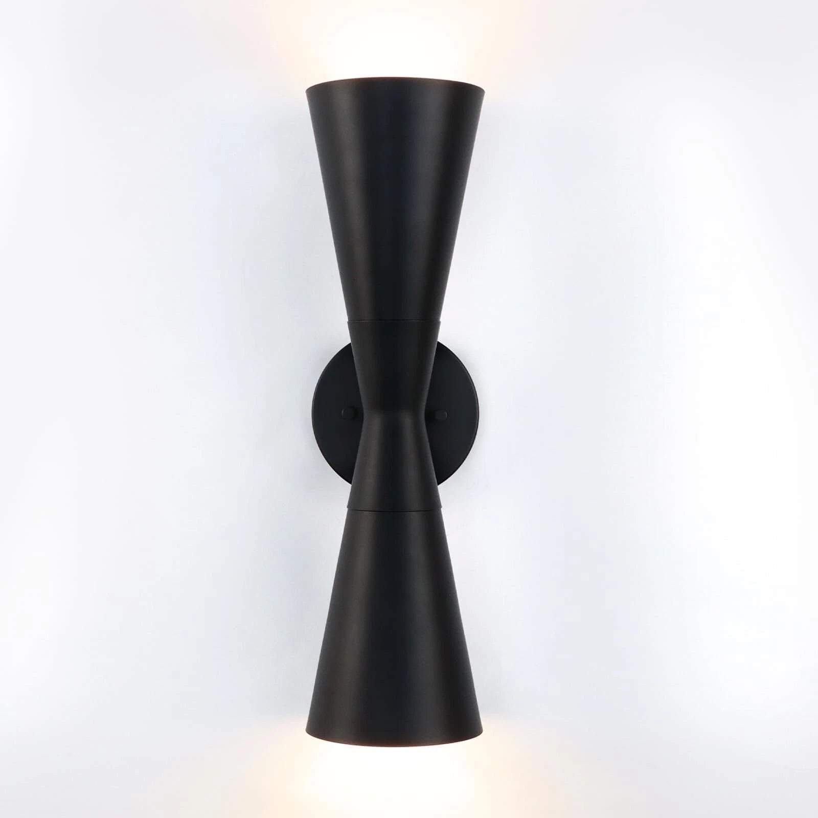 Modern black wall sconce showcases a refined up-and-down lighting design